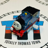 Clear Glitter Thomas Grinning Newer Face Peeling/Missing Stickers Capsule Plarail Wind Up - Used