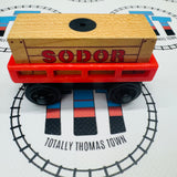 Wagon de marchandises rouge ou orange avec cargaison en bois beige - Occasion