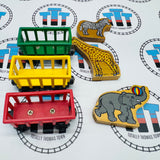 Trains de cirque (Learning Curve 1996) avec éléphant, lion, girafe et zèbre en bois - Occasion