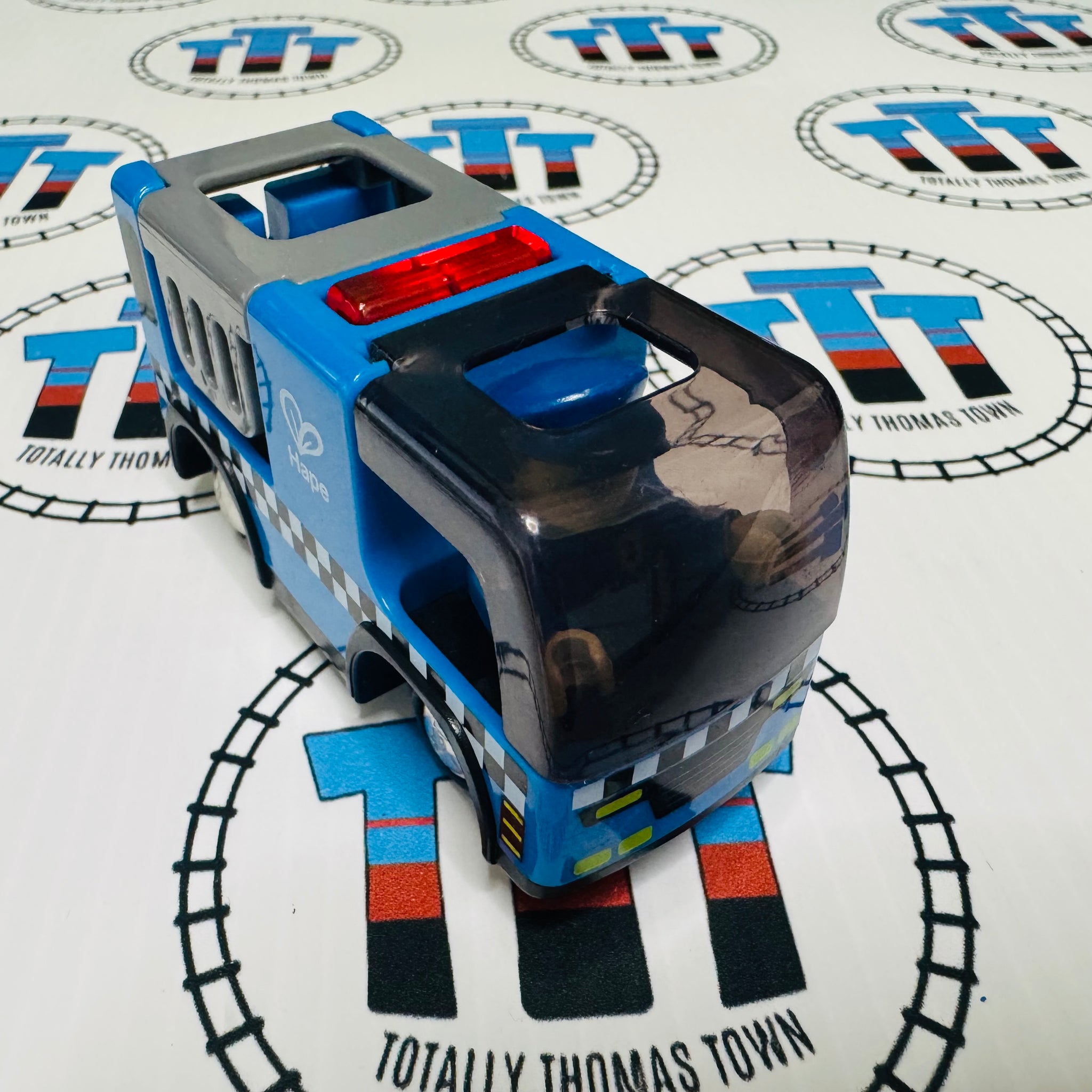 Police Car with Siren and 1 Figure Hape Train Wooden - Used