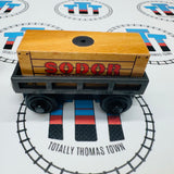 Wagon de marchandises noir avec chargement en bois marron clair - Occasion